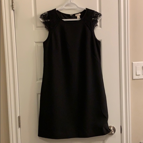 Timeless black dress with the prettiest details. - Picture 1 of 2